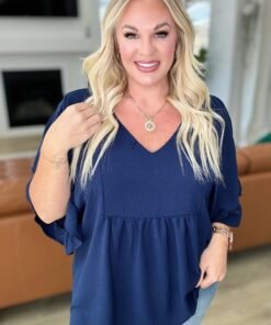 Airflow Peplum Ruffle Sleeve Top in Navy - Fashion Are Us, LLC