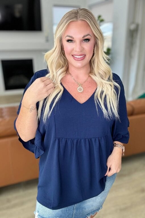 Airflow Peplum Ruffle Sleeve Top in Navy - Fashion Are Us, LLC