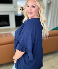 Airflow Peplum Ruffle Sleeve Top in Navy - Fashion Are Us, LLC