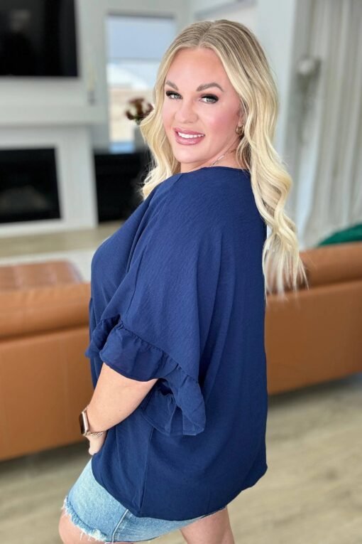 Airflow Peplum Ruffle Sleeve Top in Navy - Fashion Are Us, LLC